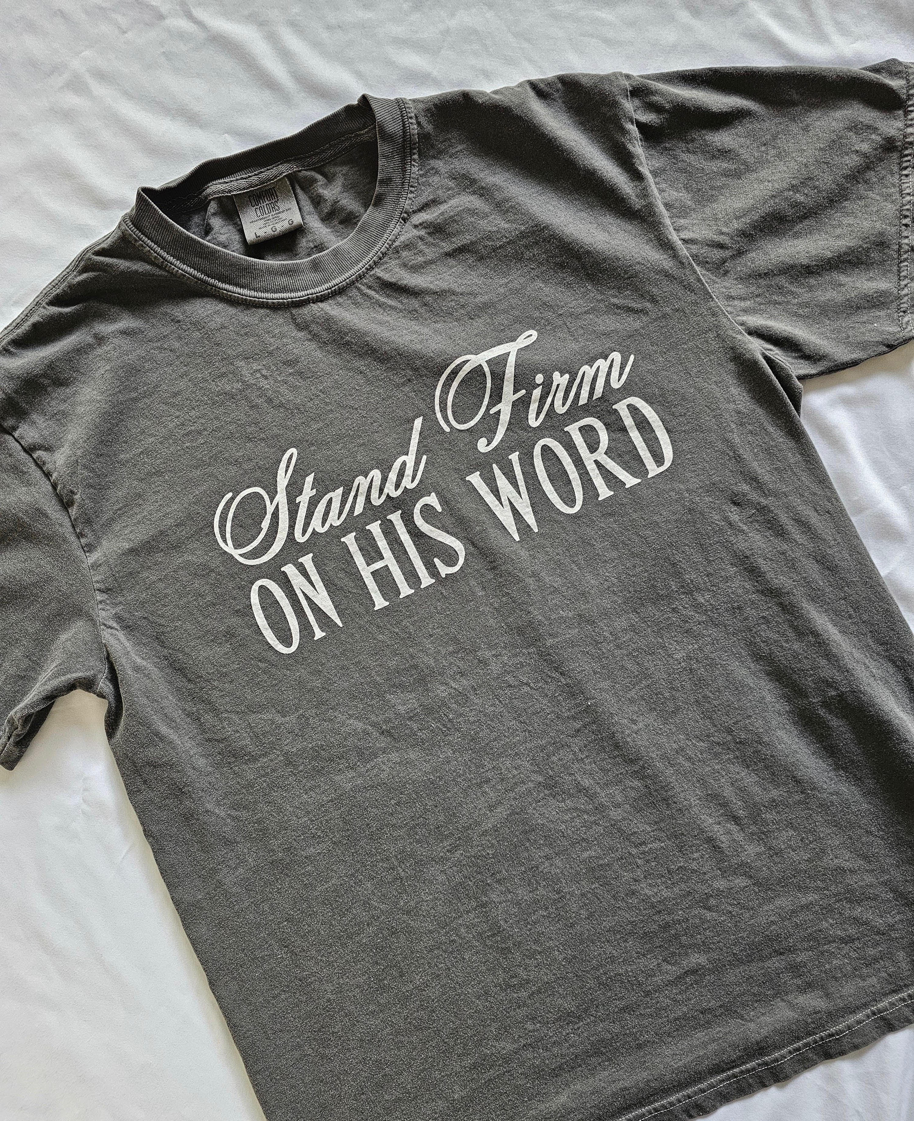 a t - shirt that says stand firm on his word
