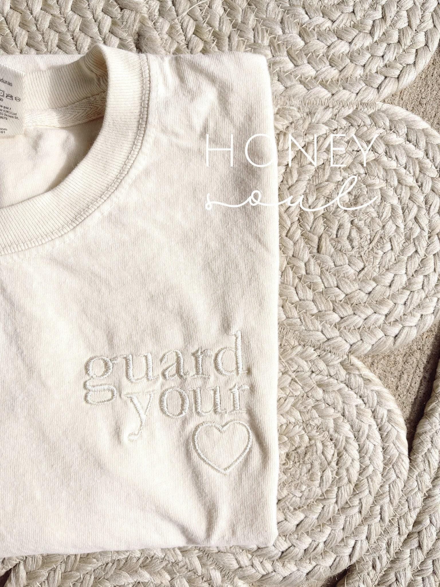 Embroidered guard your heart tee