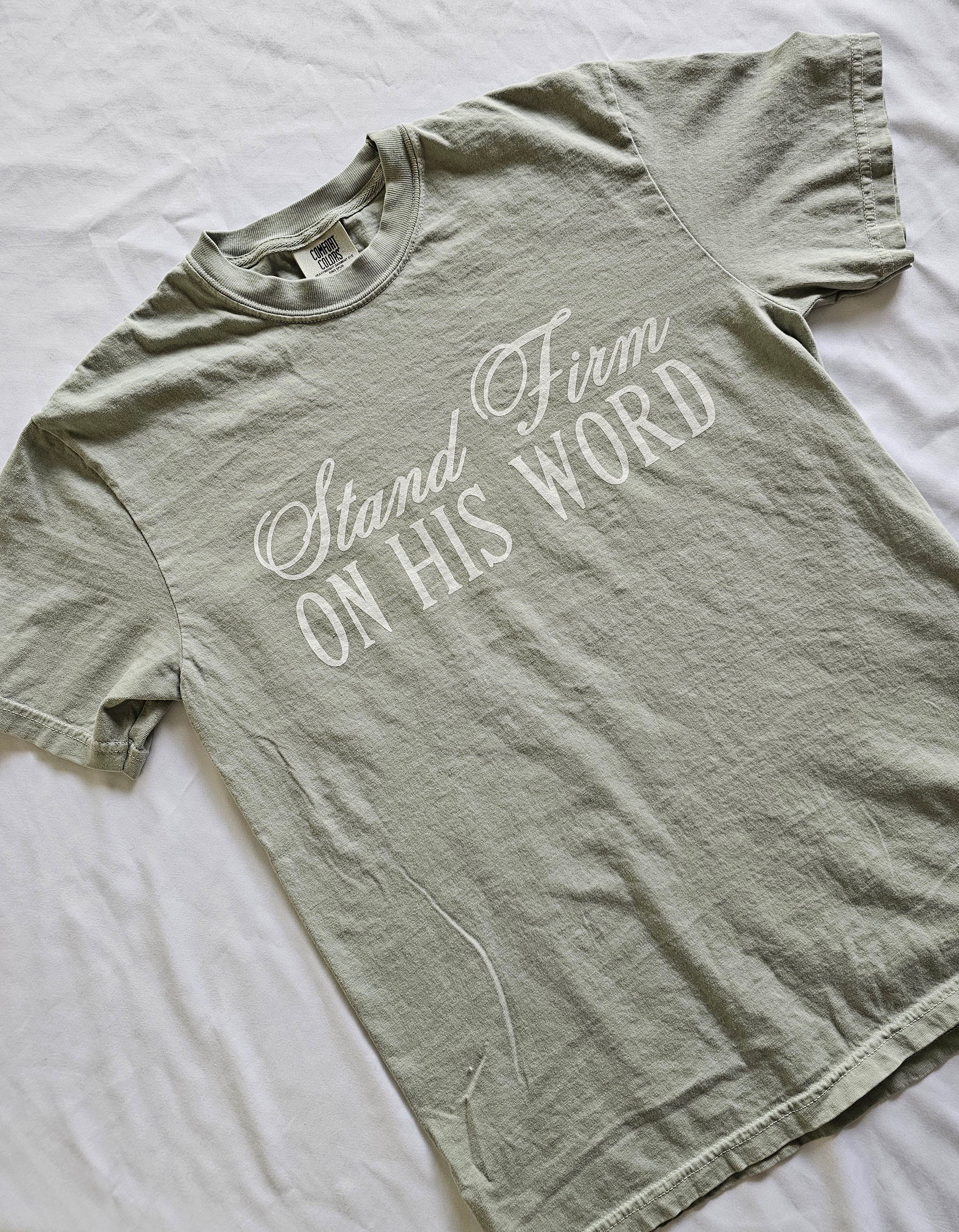 a t - shirt that says stand firm on his word