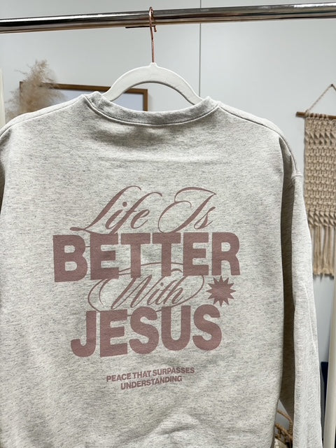a sweatshirt that says life is better with jesus on it