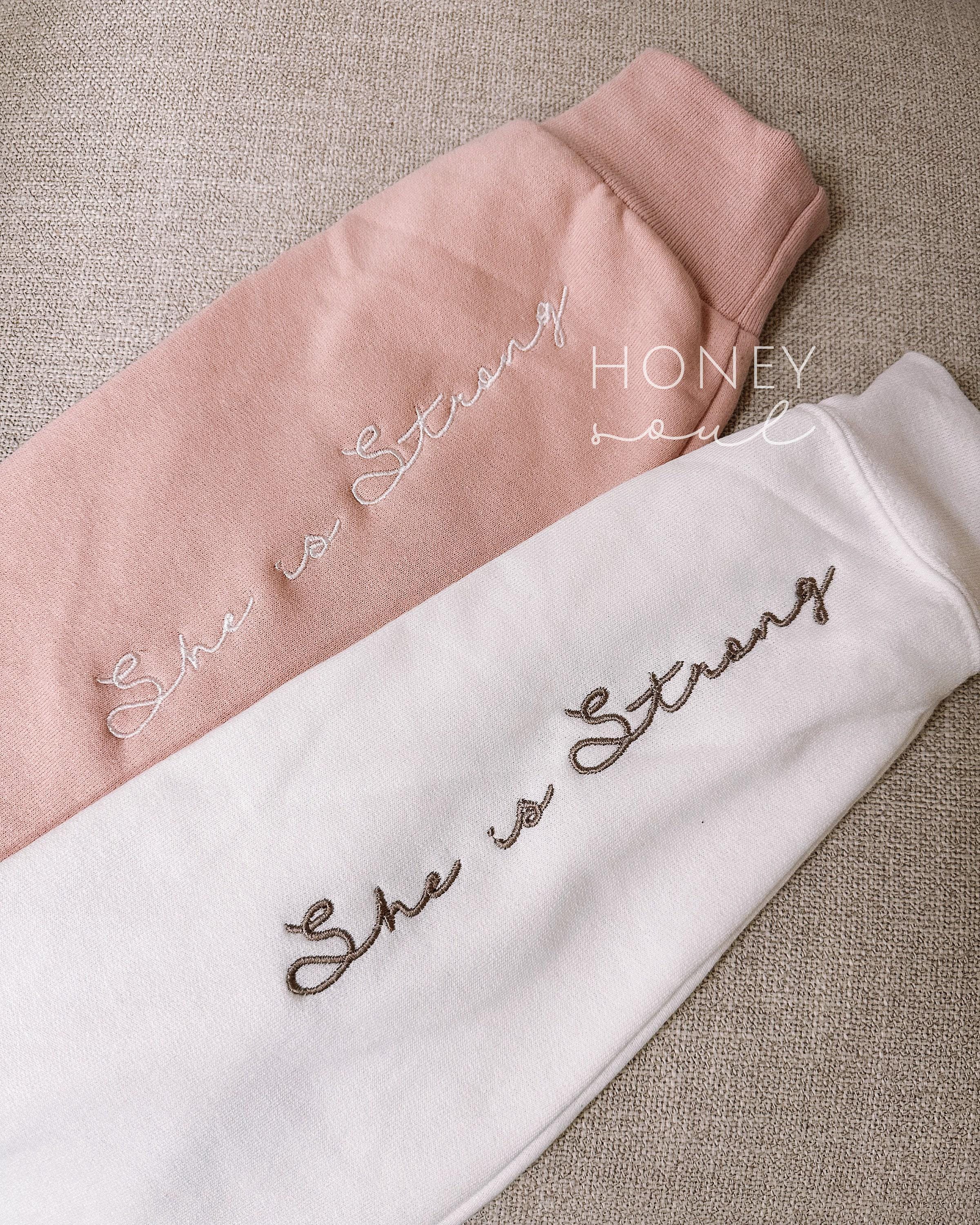 Embroidered She is Strong Sweatshirt