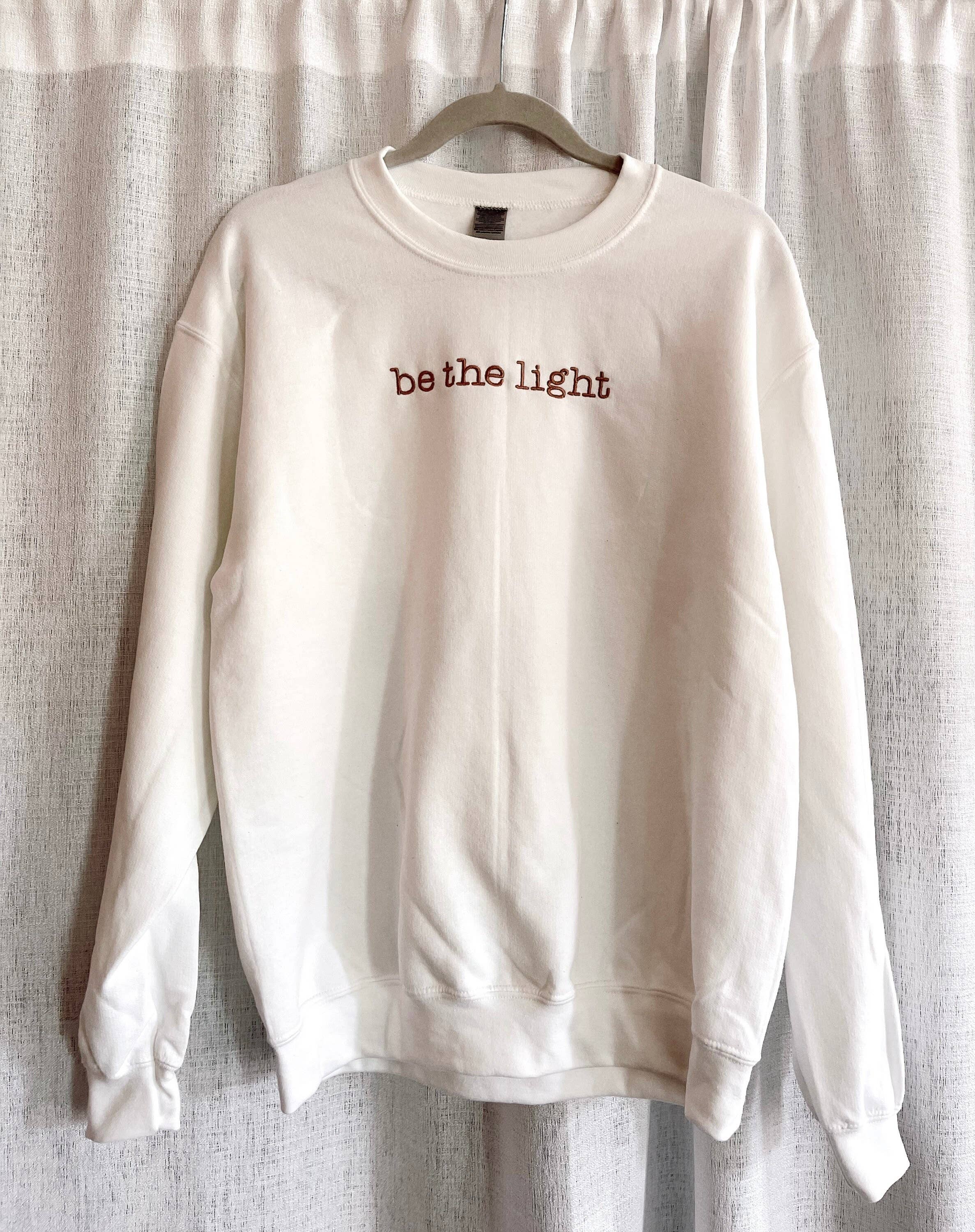 Embroidered ‘Be The Light’ Sweatshirt