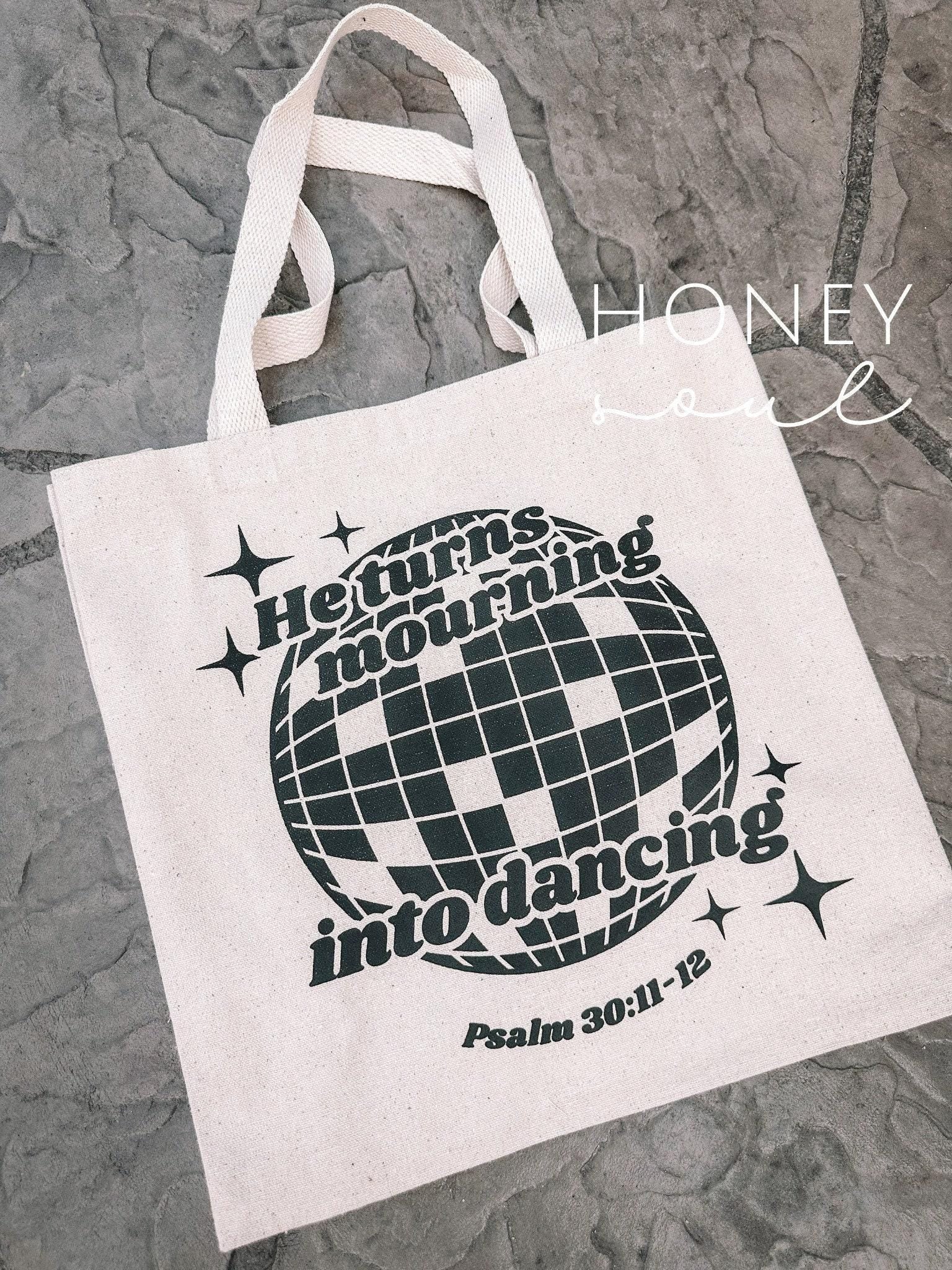 Mourning into Dancing Tote Bag