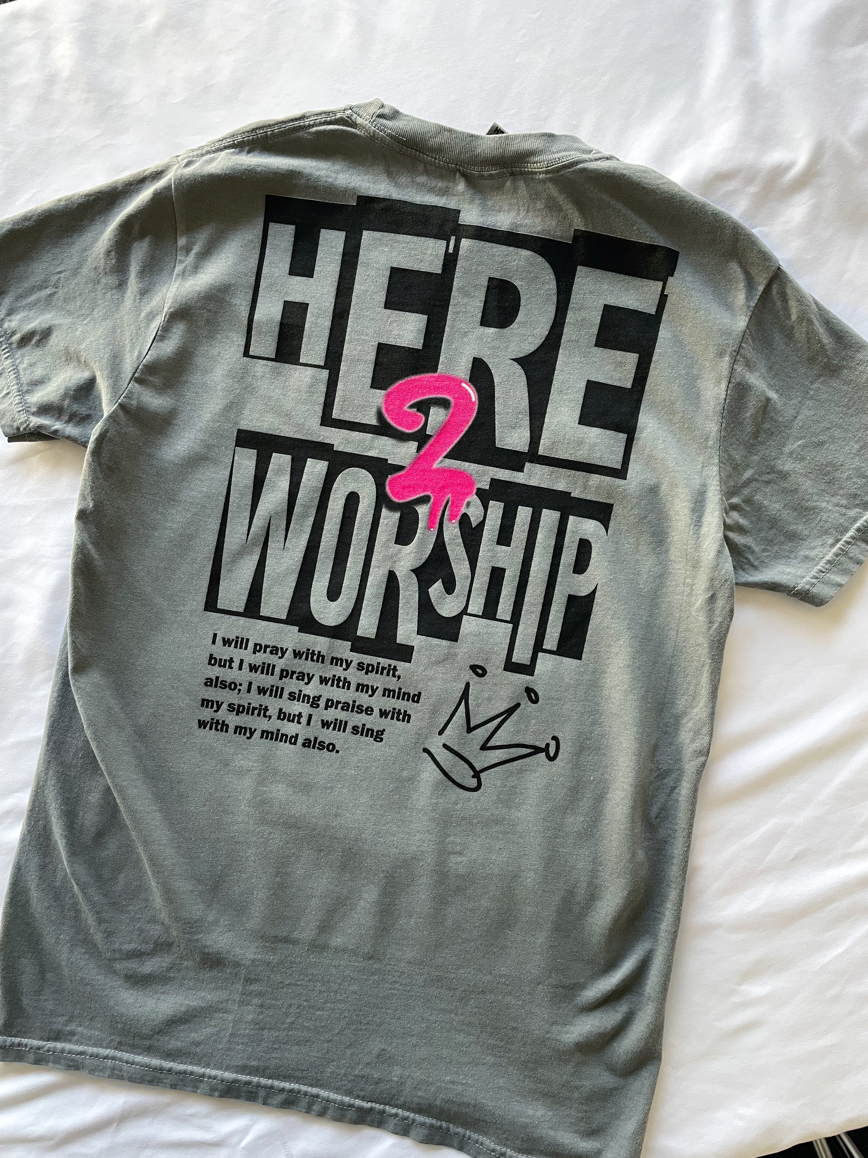 a t - shirt that says here is worship on it