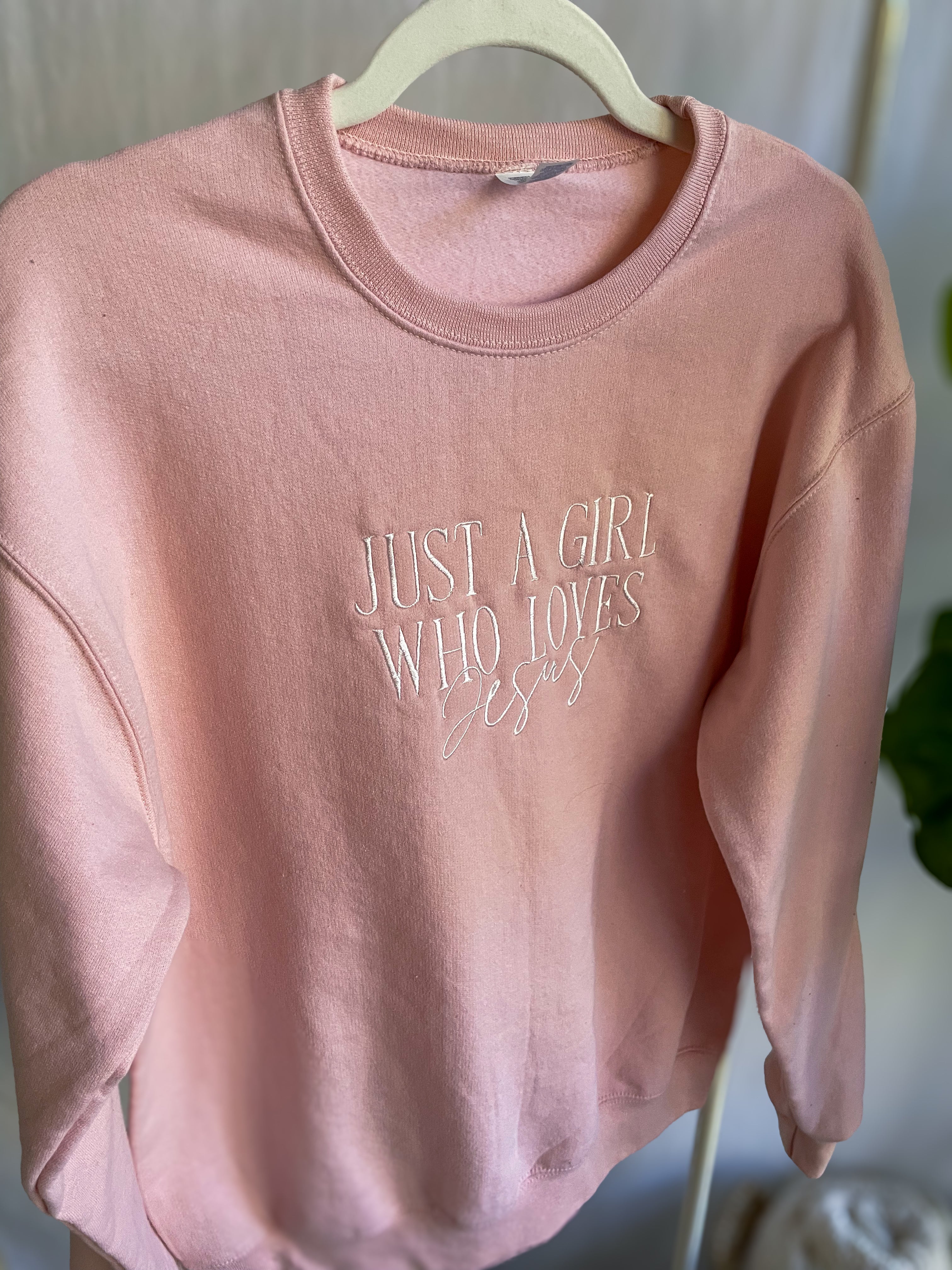 Embroidered JUST A GIRL WHO LOVES JESUS Sweatshirt
