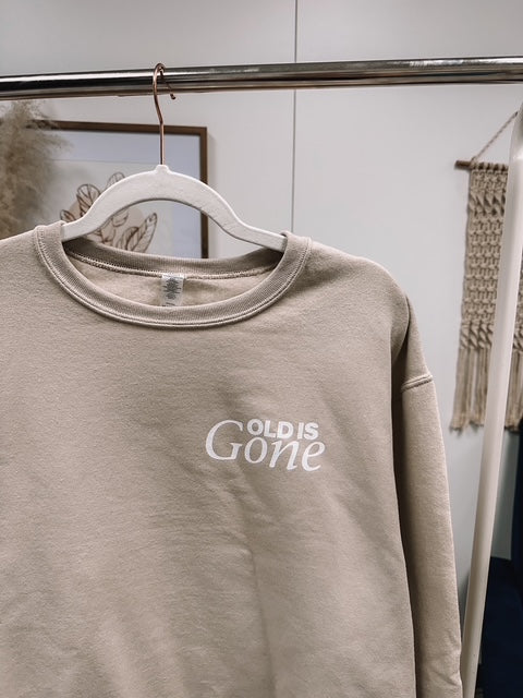 a t - shirt with the words god's gone on it hanging on a